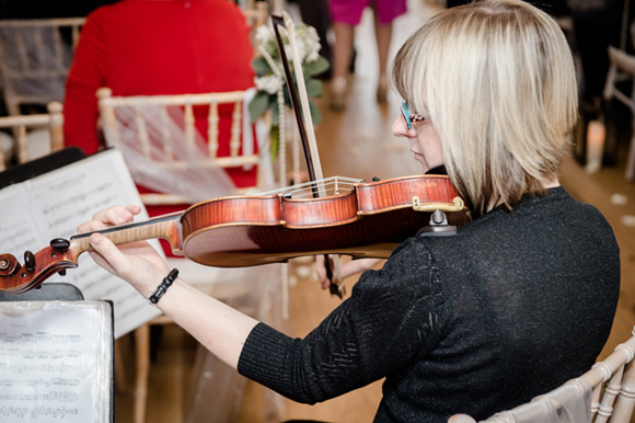 photo of Taz playing at wedding ceremony